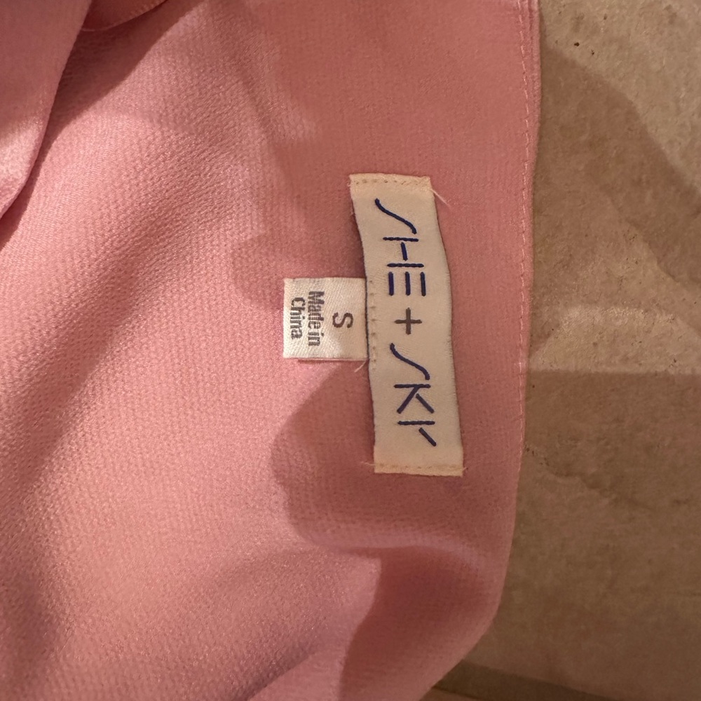 New without tags women’s rose colored bodysuit